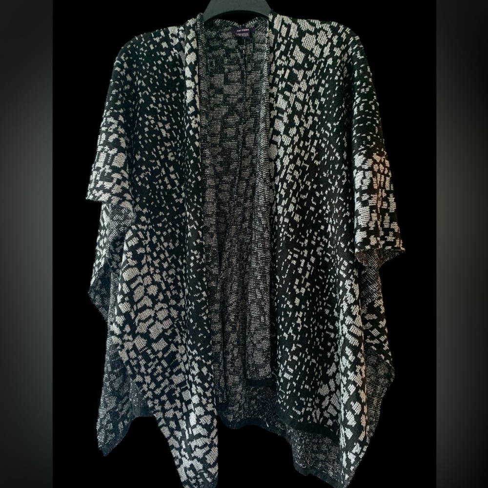 Woman’s sweater shawl